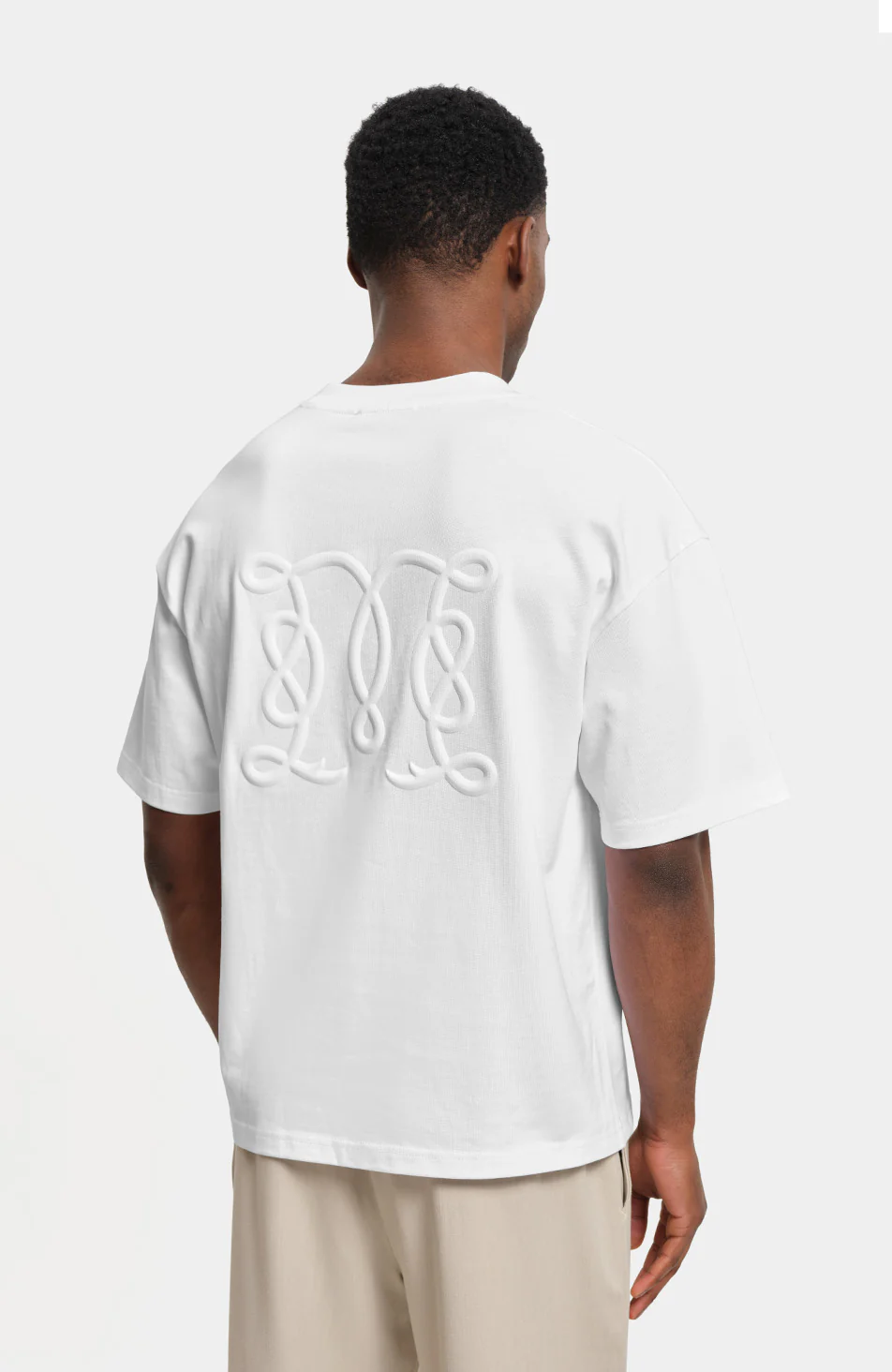 Embossed Monogram Back Logo T-shirt in White - Image 6