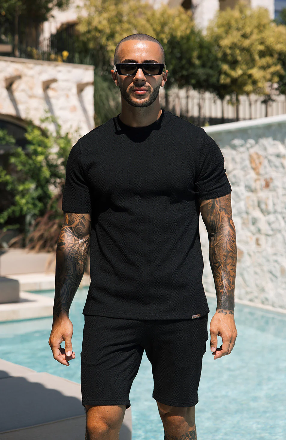 Tanami Textured Stretch Slim Shorts in Black - Image 8
